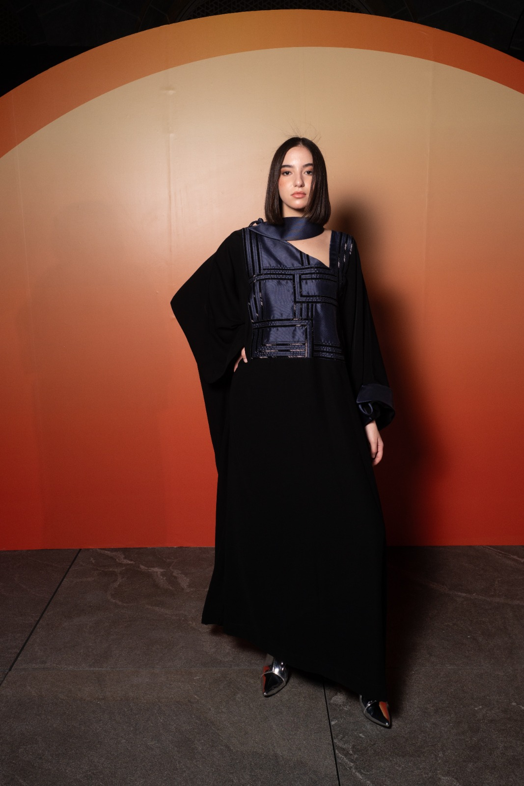 Editorial 01 — architectural black gown with satin bodice
