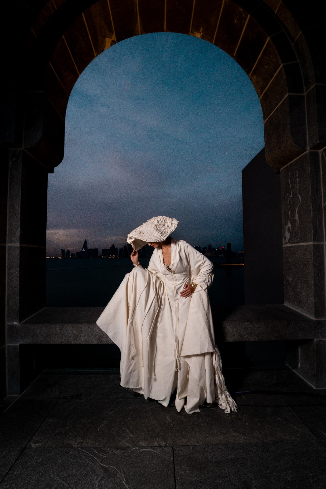 Editorial 03 — ivory drape framed by arch